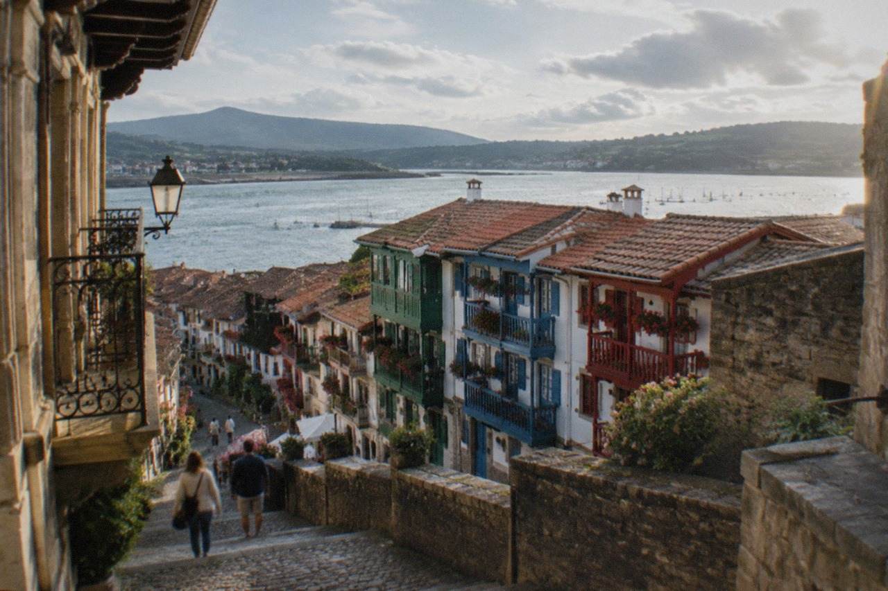 The walled old town of Hondarribia with its colourful fishermen's houses under a summer sky