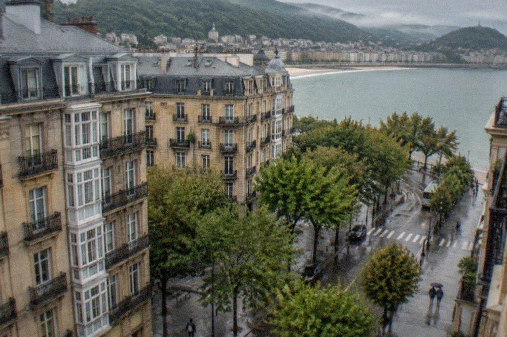 Green Basque hills with morning mist and a river valley below