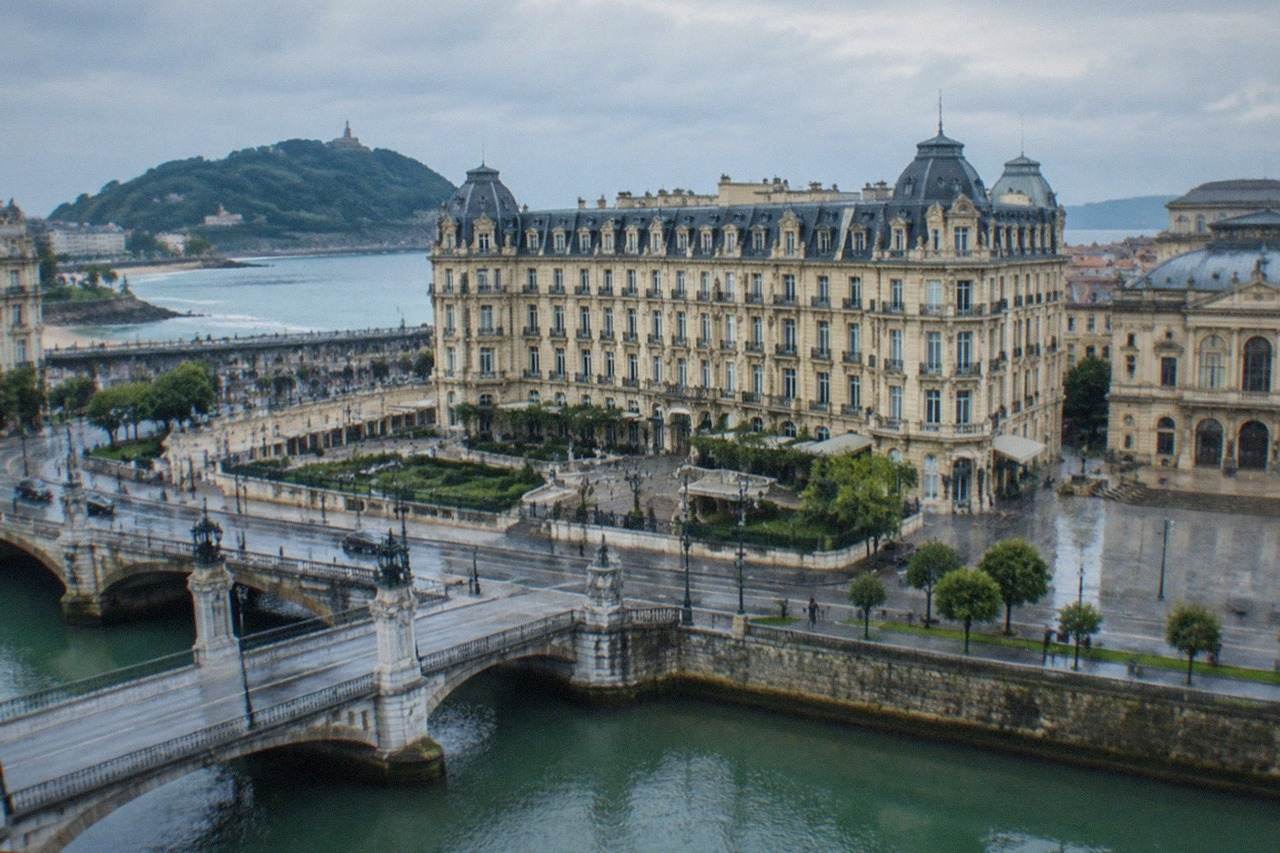 The ornate facade of a grand belle epoque hotel beside the Urumea river in San Sebastián