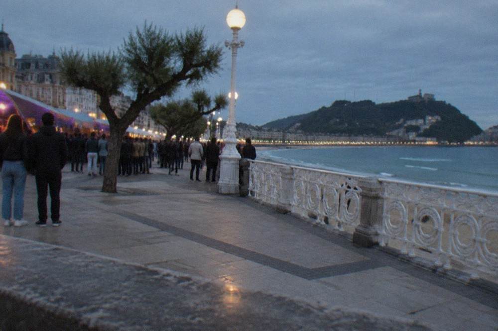 Crowds gathered outside a festival venue on the seafront promenade in San Sebastián