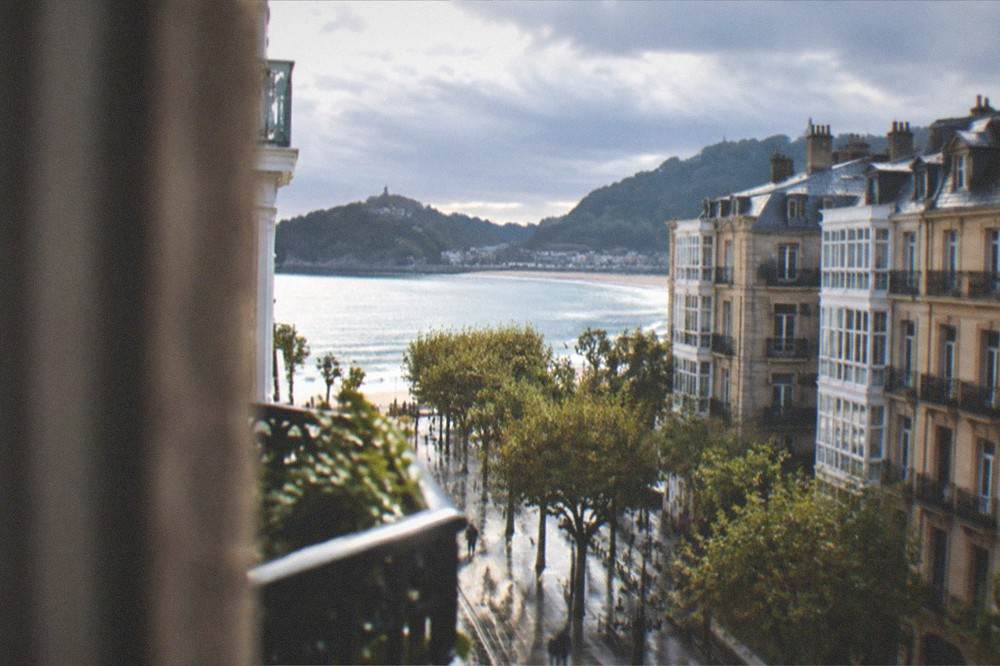Clouds moving over the rooftops and the bay of San Sebastián seen from a Centro balcony