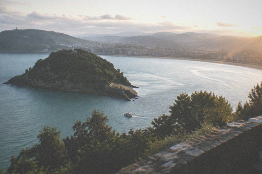 Santa Clara island and the curve of the bay seen from the hilltop terrace