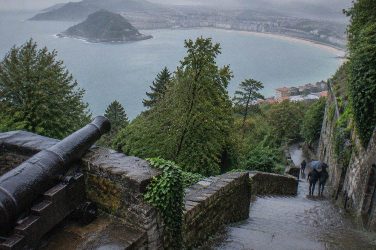 Wooded slopes of Monte Urgull rising above the buildings of San Sebastián and La Concha bay