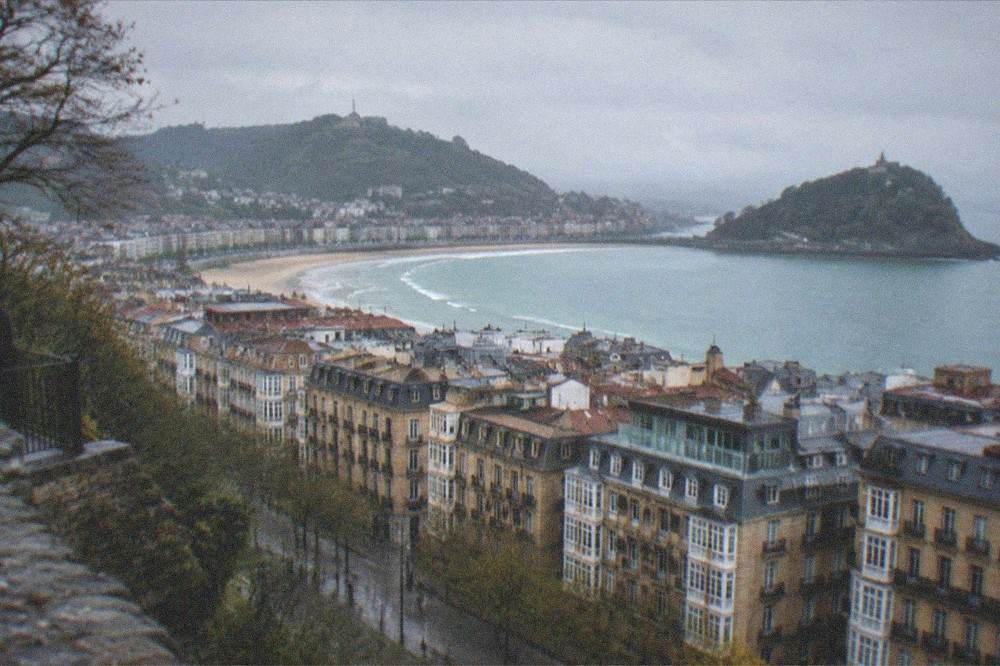 The view over the Old Town rooftops of San Sebastián toward La Concha bay from Monte Urgull