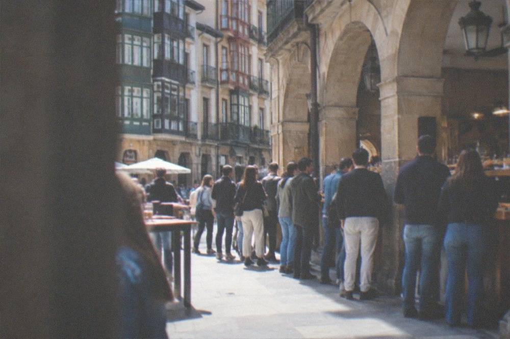 Pintxo bars with crowds standing at the counter in the old quarter of Bilbao