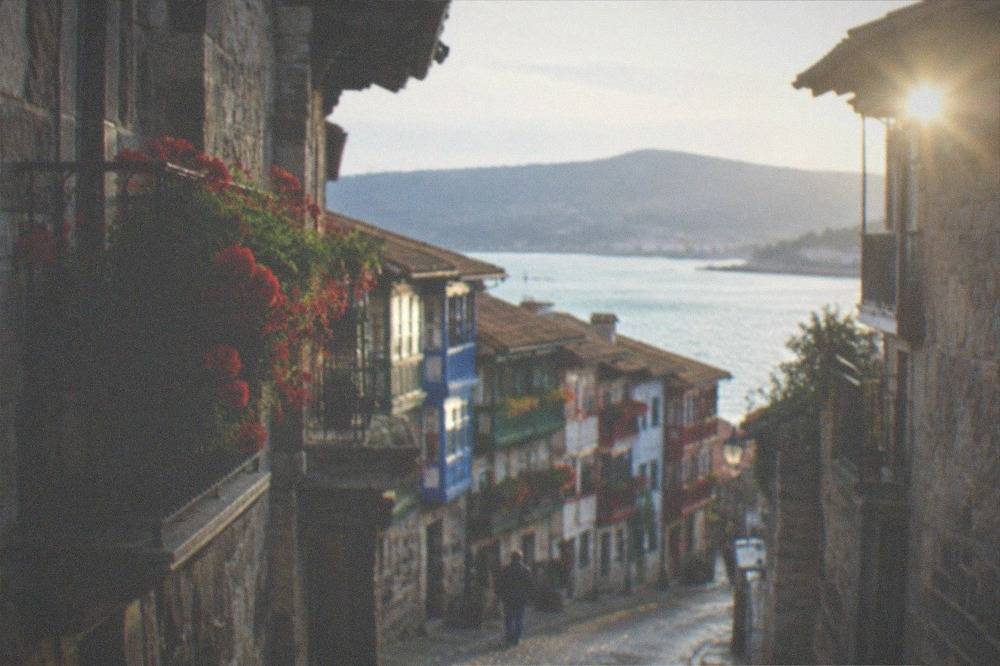 A narrow stone street inside the walled old town of Hondarribia
