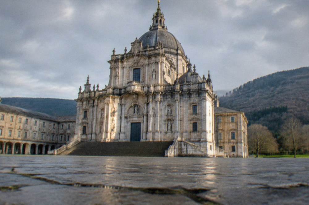 Sunlight on the facade of the Loyola basilica with the esplanade empty in the early morning