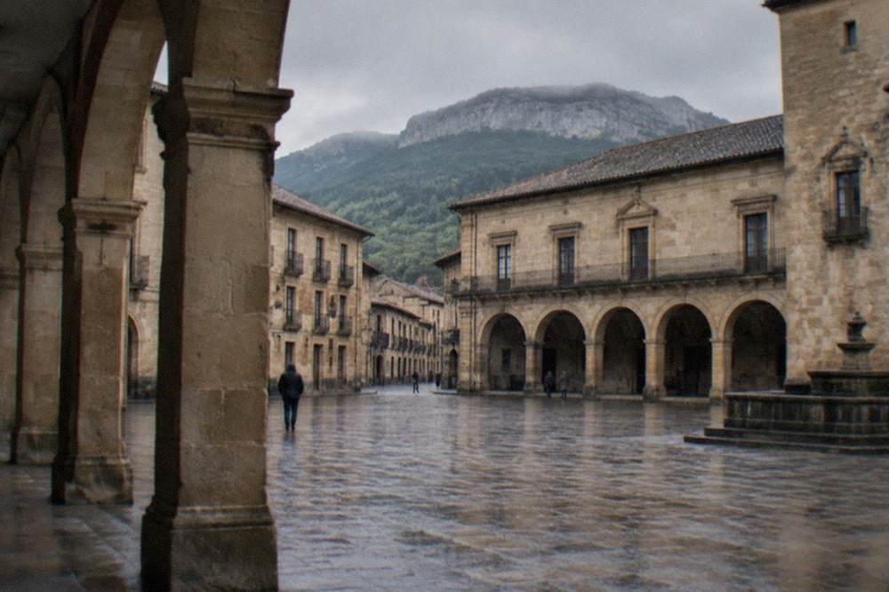 Arcaded stone square in the old quarter of Onati on a quiet morning