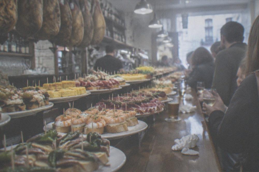 Pintxo bars in San Sebastián's old town with counters of small skewered dishes