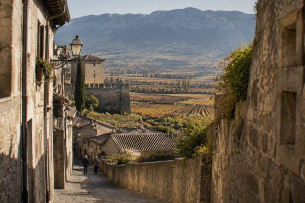 Narrow stone street inside the walled old town of Laguardia