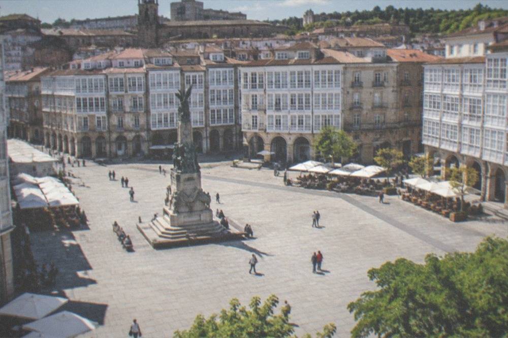 Plaza de la Virgen Blanca in Vitoria-Gasteiz with arcaded buildings and café terraces