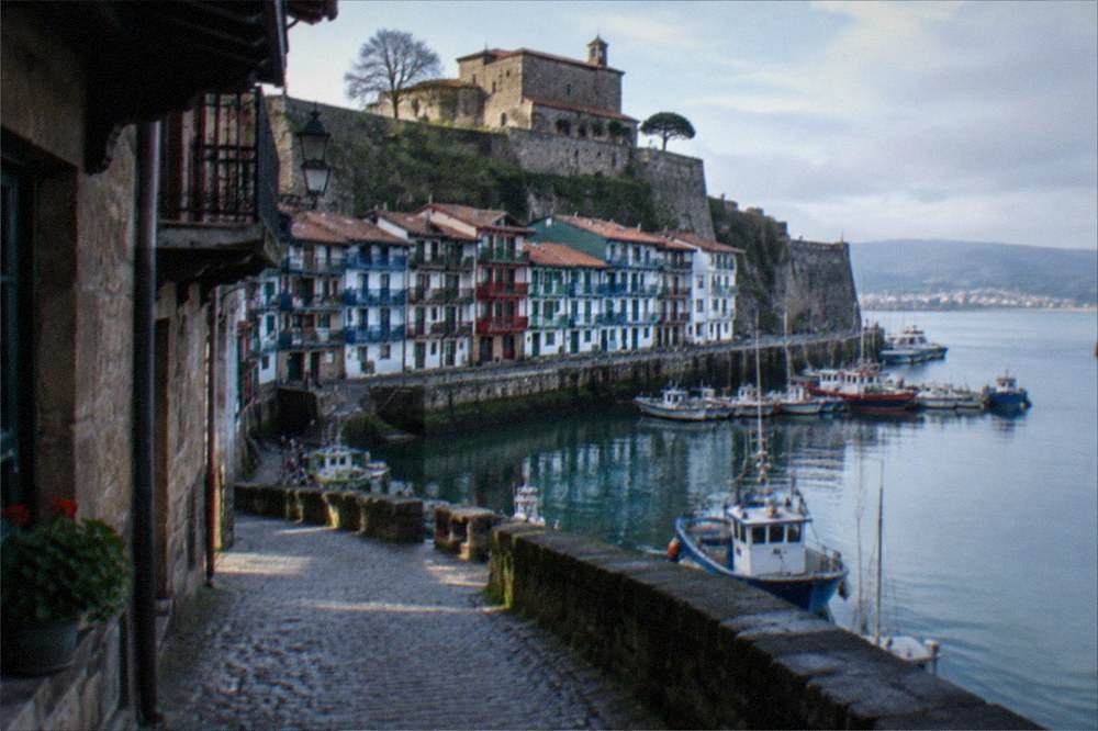 Harbour waterfront in Hondarribia with colourful fishermen houses and boats