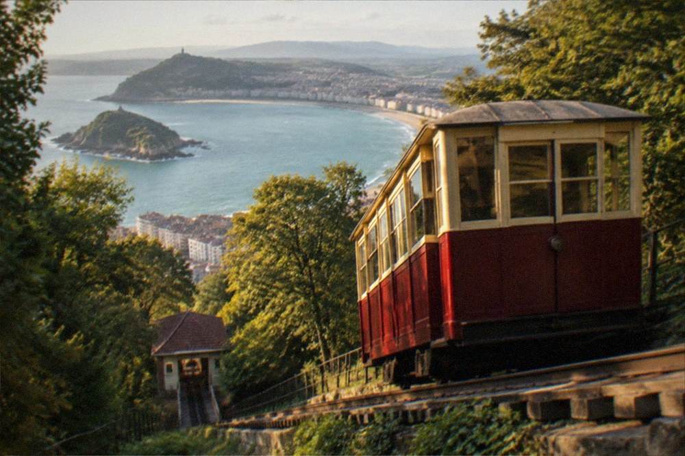 The wooden funicular car on Monte Igueldo with the bay spread out below in clear weather