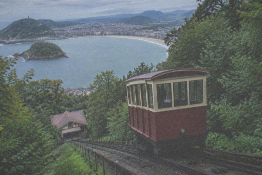 The wooden funicular car on Monte Igueldo with the bay and city spread below