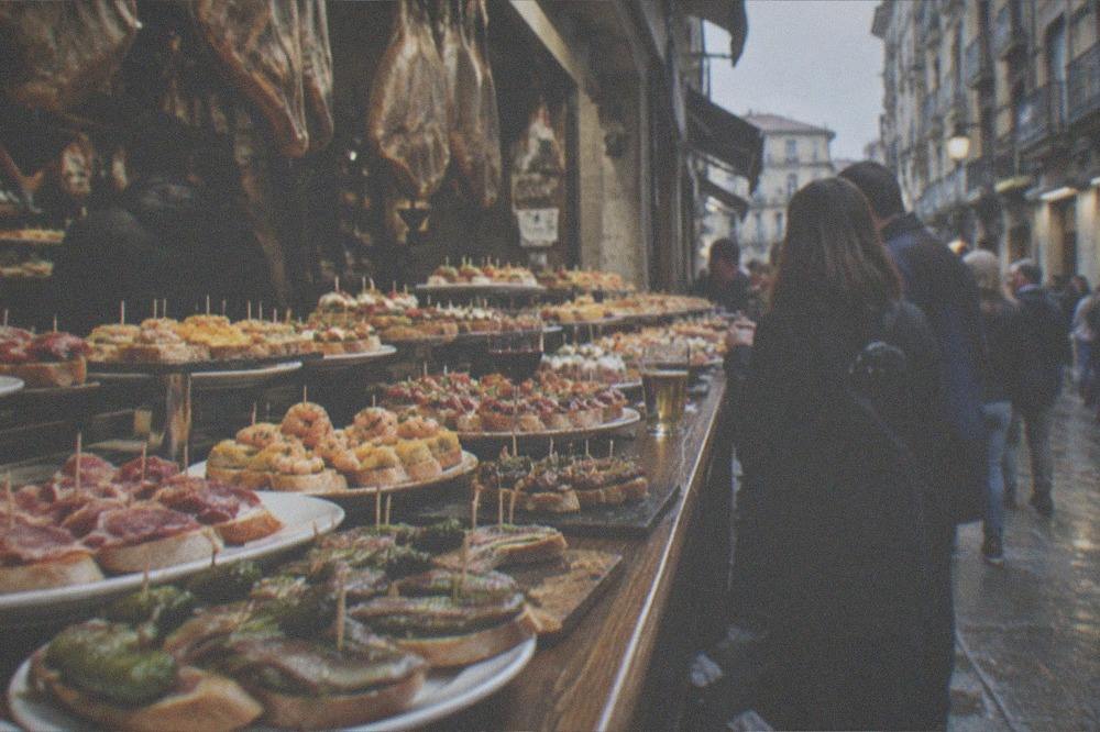 Evening crowds outside pintxo bars in the Parte Vieja old quarter
