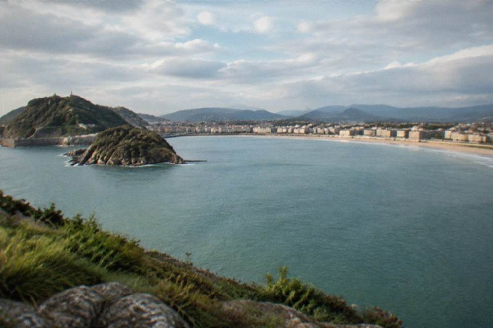 La Concha bay seen from a headland with the beach curving along the city