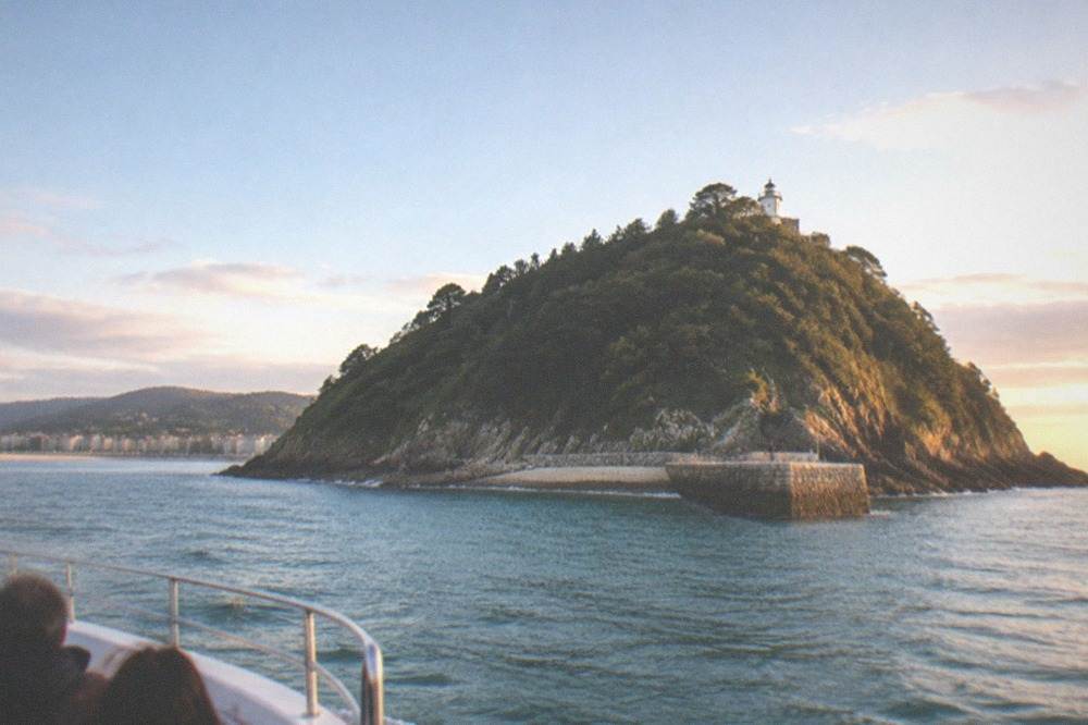 The Santa Clara island boat approaching the small island jetty in the bay