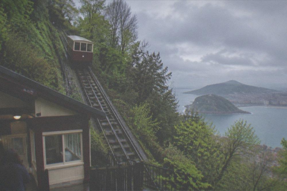 The wooden funicular car climbing Monte Igueldo above La Concha bay