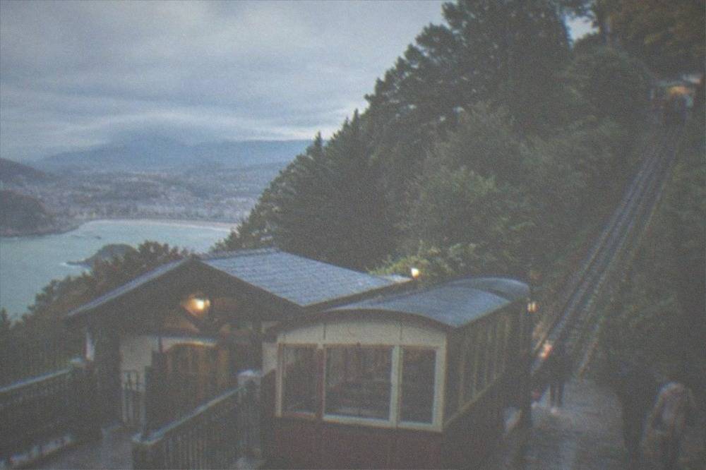 The Monte Igueldo funicular station with its wooden funicular car at the bottom of the hill