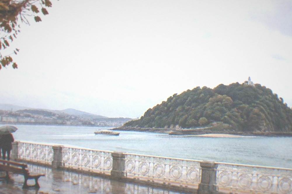 The La Concha promenade in soft autumn light with the bay and Santa Clara island beyond