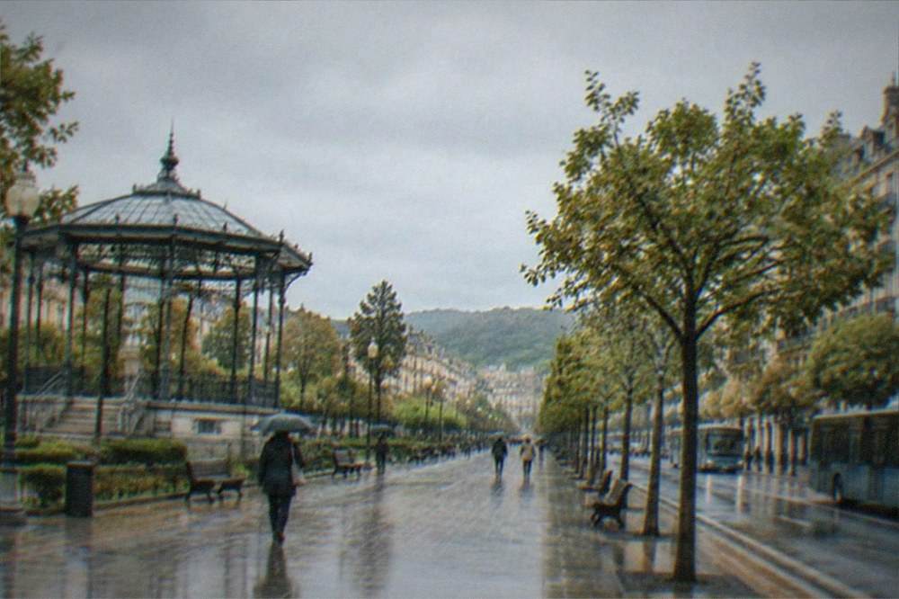 City street with tram-style boulevard and buildings in the centre of San Sebastián