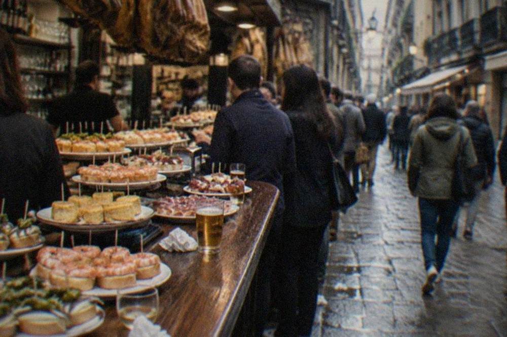 Pintxo bars with crowded counters in the narrow streets of the Parte Vieja old town