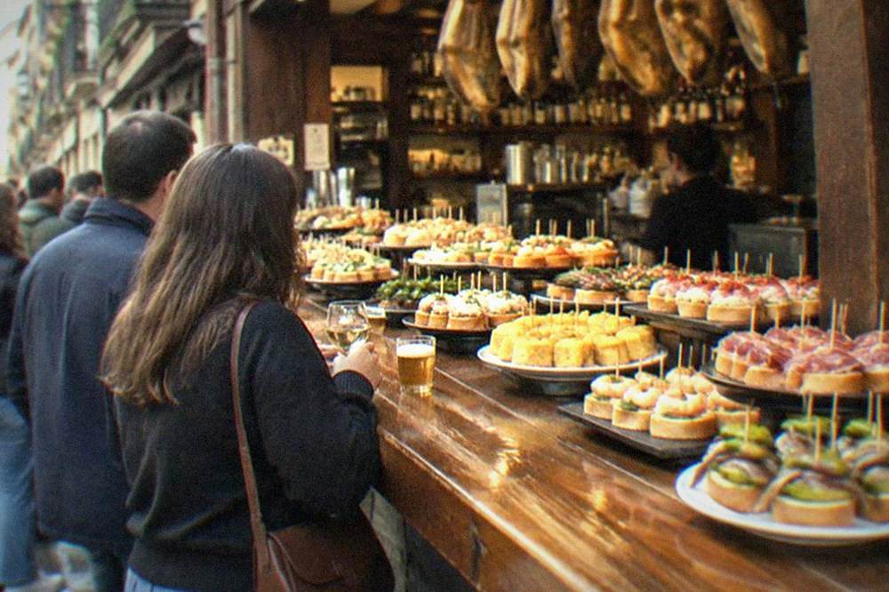 Pintxo bars and tavern fronts in the Parte Vieja old quarter of San Sebastián in the early evening