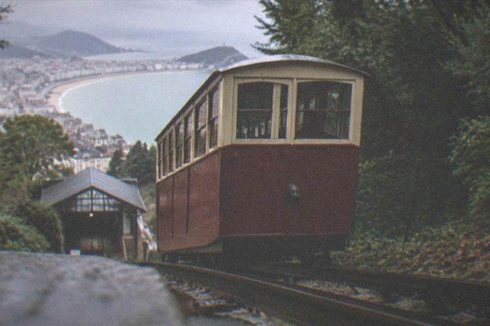 The wooden funicular car of Monte Igueldo climbing the hill above San Sebastián
