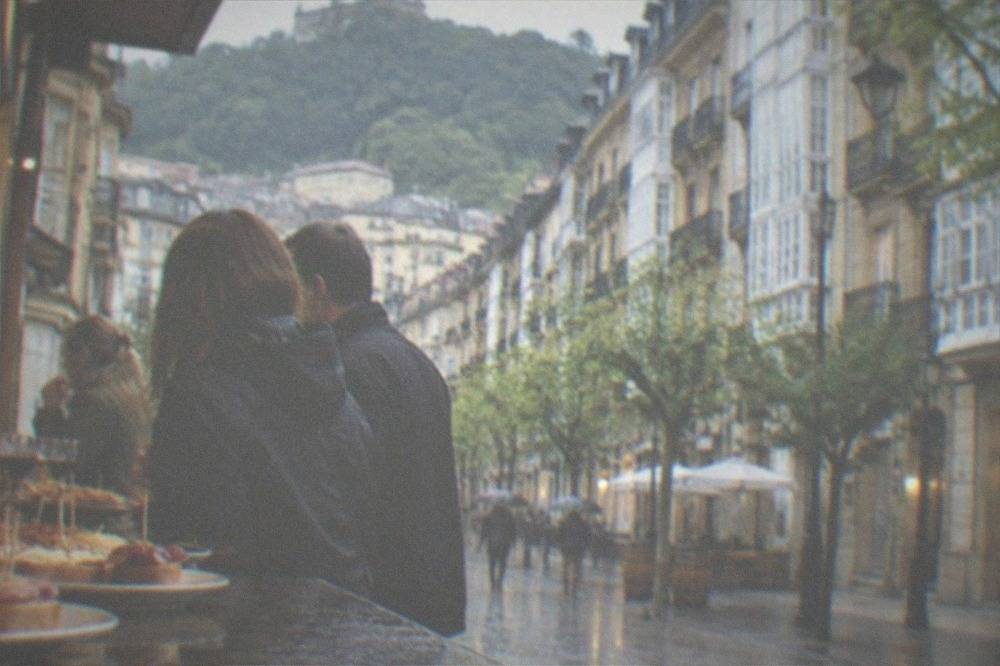 People standing at a bar eating pintxos in the Old Town of San Sebastián