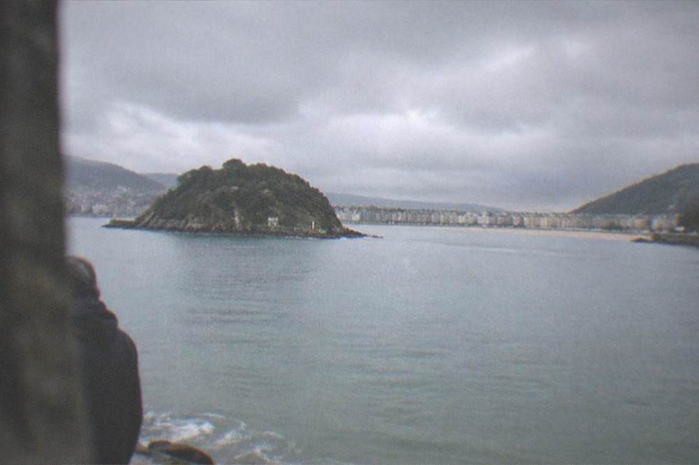Rain clouds over the La Concha bay and the two hills on either side of San Sebastián