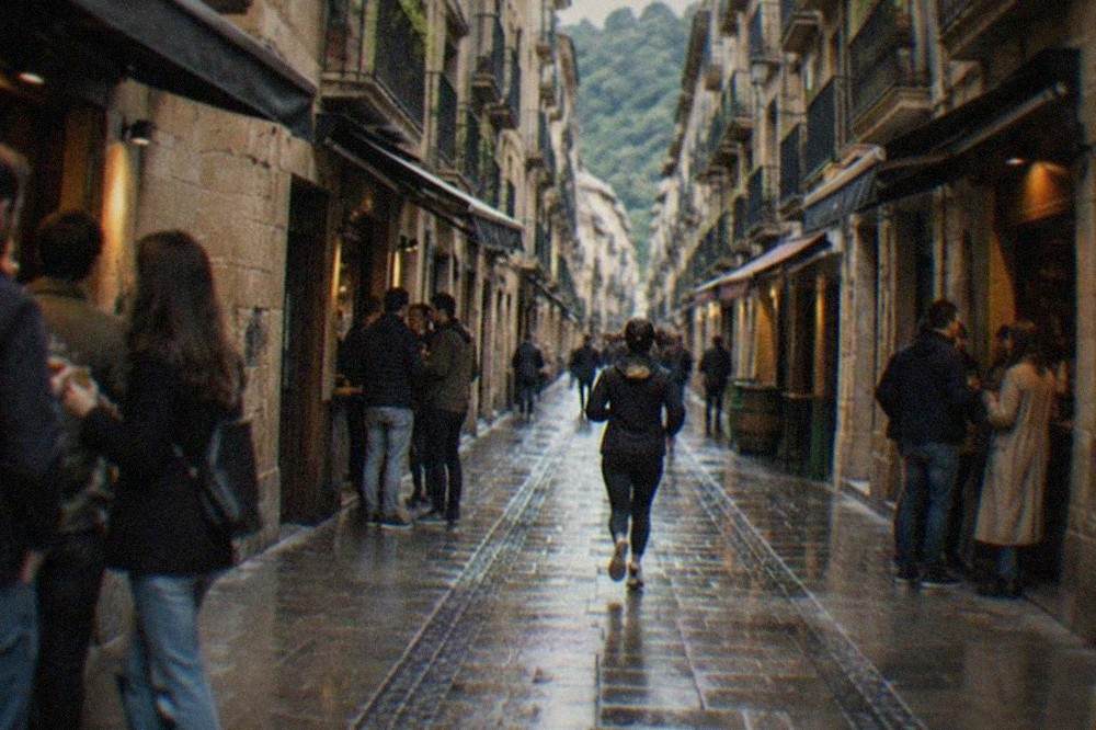 Narrow old streets with tall buildings and bar awnings in the Parte Vieja of San Sebastián