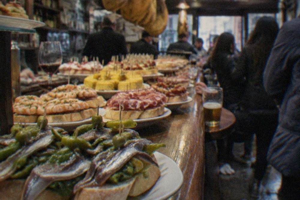 Pintxo bars with crowds standing at the counter in the Old Town of San Sebastián